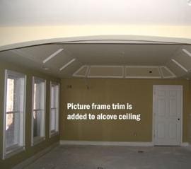 A room with a picture frame trim is added to the alcove ceiling.