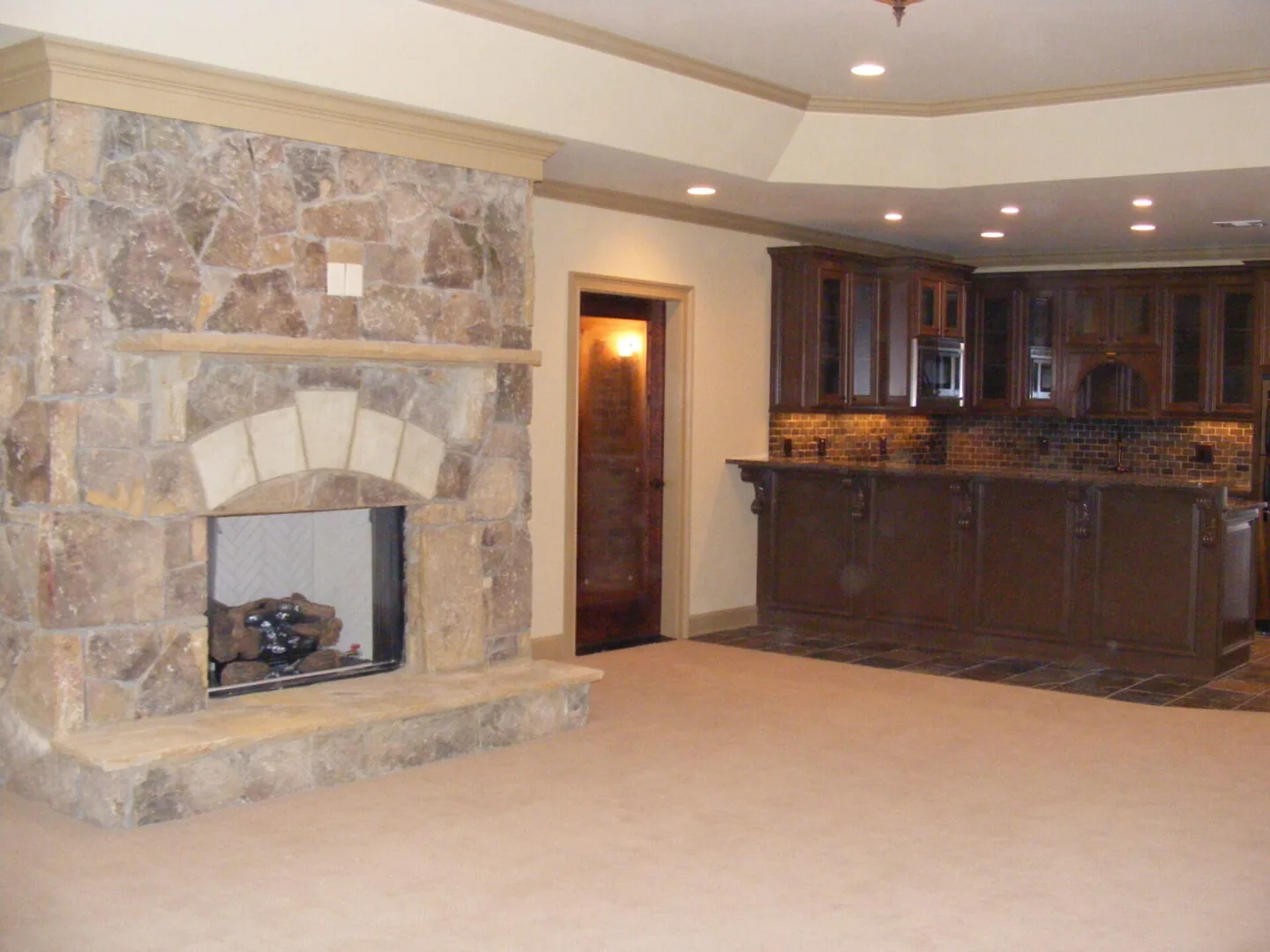 Basement living space with custom bar area